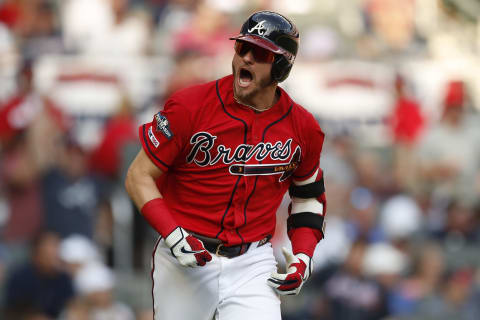 ATLANTA, GEORGIA – OCTOBER 04: Josh Donaldson #20 of the Atlanta Braves reacts after an RBI single off Jack Flaherty #22 of the St. Louis Cardinals in the first inning in game two of the National League Division Series at SunTrust Park on October 04, 2019 in Atlanta, Georgia. (Photo by Todd Kirkland/Getty Images)