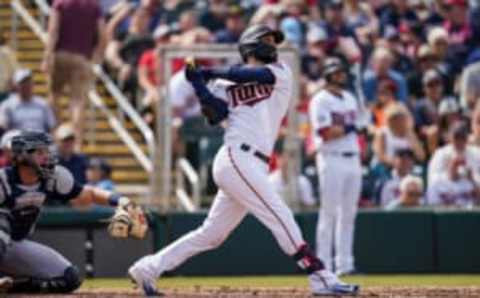 Marwin Gonzalez of the Minnesota Twins bats and hits a home run during a spring training game against the Detroit Tigers. (Photo by Brace Hemmelgarn/Minnesota Twins/Getty Images)