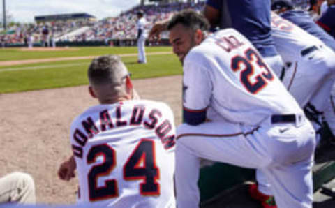 Josh Donaldson talks with Nelson Cruz of the Minnesota Twins during a spring training game between the Atlanta Braves and Minnesota Twins on March 11, 2020 at Hammond Stadium in Fort Myers, Florida. (Photo by Brace Hemmelgarn/Minnesota Twins/Getty Images)