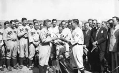 Muddy Ruel is presented with a token of the Senators’ esteem by Joe Judge, right (Photo by Mark Rucker/Transcendental Graphics, Getty Images)