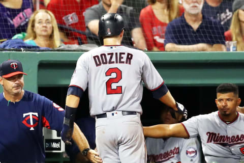 BOSTON, MA – JULY 26: Brian Dozier #2 of the Minnesota Twins returns to the dugout after scoring in the eighth inning of a game against the Boston Red Sox at Fenway Park on July 26, 2018 in Boston, Massachusetts. (Photo by Adam Glanzman/Getty Images)