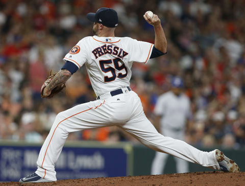 HOUSTON, TX – JULY 28: Ryan Pressly #55 of the Houston Astros pitches in the seventh inning against the Texas Rangers at Minute Maid Park on July 28, 2018 in Houston, Texas. (Photo by Bob Levey/Getty Images)