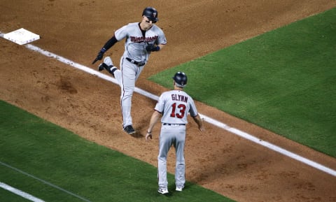 ARLINGTON, TX – AUGUST 31: Tyler Austin #31 of the Minnesota Twins celebrates with third base coach Gene Glynn #13 after hitting a solo home run against the Texas Rangers during the fifth inning at Globe Life Park in Arlington on August 31, 2018 in Arlington, Texas. (Photo by Ron Jenkins/Getty Images)