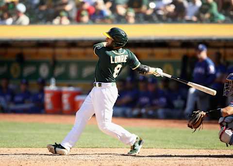 OAKLAND, CA – SEPTEMBER 08: Jed Lowrie #8 of the Oakland Athletics bats against the Texas Rangers at Oakland Alameda Coliseum on September 8, 2018 in Oakland, California. (Photo by Ezra Shaw/Getty Images)