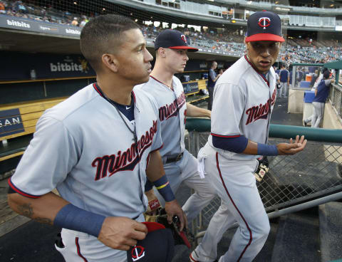 DETROIT, MI – SEPTEMBER 17: Jorge Polanco #11 of the Minnesota Twins, right, talks with Ehire Adrianza #16 of the Minnesota Twins, left, as they head to the field with Max Kepler #26 of the Minnesota Twins during the first inning at Comerica Park on September 17, 2018 in Detroit, Michigan. The Twins defeated the Tigers 6-1. (Photo by Duane Burleson/Getty Images)