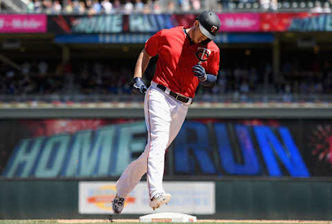 MINNEAPOLIS, MN – JUNE 13: C.J. Cron #24 of the Minnesota Twins rounds the bases after hitting a two-run home run against the Seattle Mariners during the seventh inning of the game on June 13, 2019 at Target Field in Minneapolis, Minnesota. The Twins defeated the Mariners 10-5. (Photo by Hannah Foslien/Getty Images)