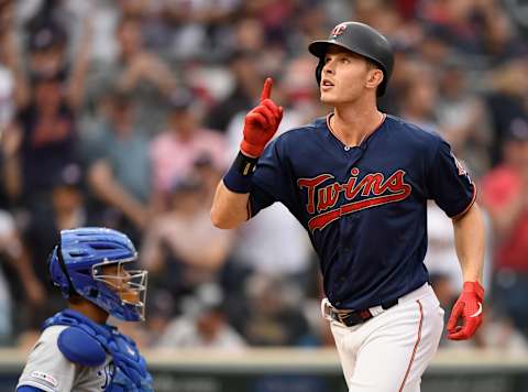 MINNEAPOLIS, MN – JUNE 15: Max Kepler #26 of the Minnesota Twins celebrates as he crosses home plate after hitting a solo home run as Brad Boxberger #26 of the Kansas City Royals looks on during the fourth inning of the game on June 15, 2019 at Target Field in Minneapolis, Minnesota. The Twins defeated the Royals 5-4. (Photo by Hannah Foslien/Getty Images)