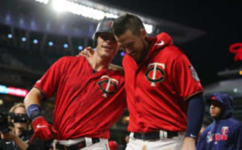 MINNEAPOLIS, MINNESOTA – JUNE 19: (L-R) Max Kepler #26 and C.J. Cron #24 of the Minnesota Twins celebrate with after defeating the Boston Red Sox 4-3 in seventeen innings at Target Field on June 19, 2018 in Minneapolis, Minnesota. (Photo by Adam Bettcher/Getty Images)