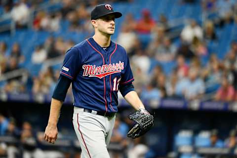 ST. PETERSBURG, FLORIDA – JUNE 02: Jake Odorizzi #12 of the Minnesota Twins walks off the field after striking out Willy Adames #1 of the Tampa Bay Rays to end the first inning at Tropicana Field on June 02, 2019 in St. Petersburg, Florida. (Photo by Julio Aguilar/Getty Images)