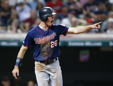 CLEVELAND, OH – JULY 12: Max Kepler #26 of the Minnesota Twins celebrates after scoring on a double by Jorge Polanco #11 off Oliver Perez #39 of the Cleveland Indians during seventh inning at Progressive Field on July 12, 2019 in Cleveland, Ohio. (Photo by Ron Schwane/Getty Images)