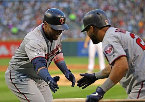 CHICAGO, ILLINOIS – JULY 25: Nelson Cruz #23 of the Minnesota Twins (L) celebrates his second home run on the game with Eddie Rosario #20 in the 3rd inning against the Chicago White Sox at Guaranteed Rate Field on July 25, 2019 in Chicago, Illinois. (Photo by Jonathan Daniel/Getty Images)