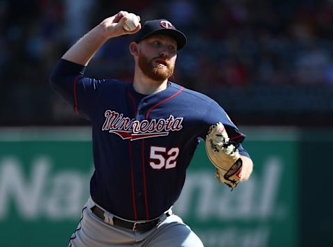 ARLINGTON, TEXAS – AUGUST 18: Zack Littell #52 of the Minnesota Twins throws against the Texas Rangers in the sixth inning at Globe Life Park in Arlington on August 18, 2019 in Arlington, Texas. (Photo by Ronald Martinez/Getty Images)