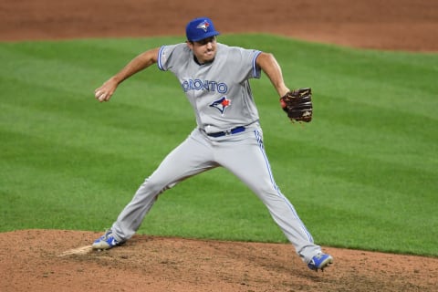 Derek Law of the Toronto Blue Jays pitches during a baseball game against the Baltimore Orioles. (Photo by Mitchell Layton/Getty Images)