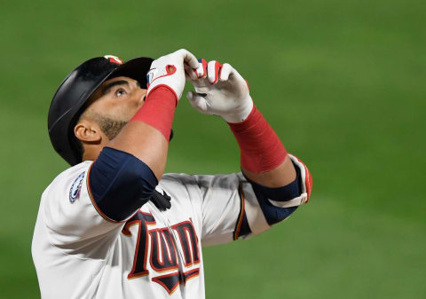 Nelson Cruz of the Minnesota Twins celebrates a hitting a solo home run against the Kansas City Royals. (Photo by Hannah Foslien/Getty Images)