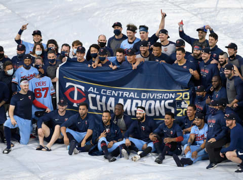 The Minnesota Twins celebrate being the American League Central Division Champions after the game against the Cincinnati Reds. (Photo by Hannah Foslien/Getty Images)