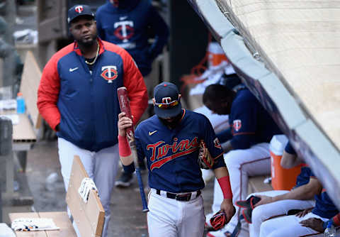 Michael Pineda and Marwin Gonzalez of the Minnesota Twins walk through the dugout after being defeated. (Photo by Hannah Foslien/Getty Images)