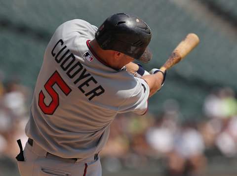 Michael Cuddyer of the Minnesota Twins takes a swing against the Chicago White Sox. (Photo by Jonathan Daniel/Getty Images)