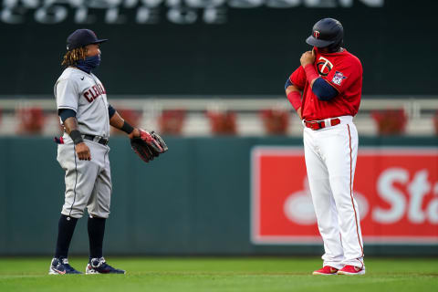 Nelson Cruz of the Minnesota Twins talks with Jose Ramirez of the Cleveland Indians. (Photo by Brace Hemmelgarn/Minnesota Twins/Getty Images)