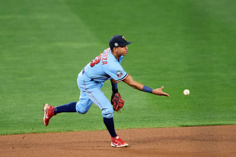 Ehire Adrianza of the Minnesota Twins makes a play at shortstop against the Detroit Tigers. (Photo by Hannah Foslien/Getty Images)