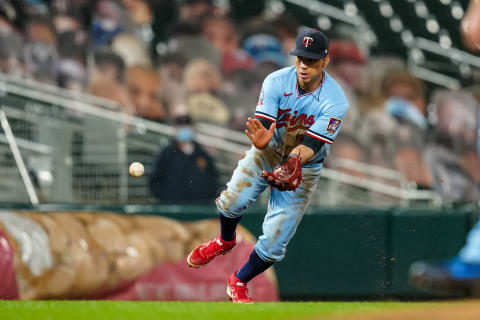 Ehire Adrianza of the Minnesota Twins fields against the Cincinnati Reds. (Photo by Brace Hemmelgarn/Minnesota Twins/Getty Images)