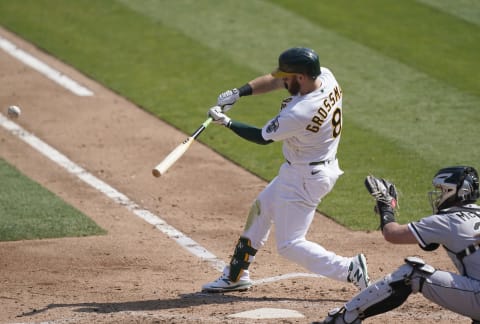 Robbie Grossman of the Oakland Athletics bats against the Chicago White Sox. (Photo by Thearon W. Henderson/Getty Images)