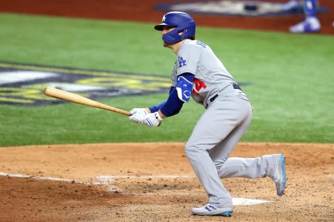 Enrique Hernandez of the Los Angeles Dodgers hits an RBI double against the Tampa Bay Rays during the sixth inning in Game Four of the 2020 MLB World Series. (Photo by Ronald Martinez/Getty Images)