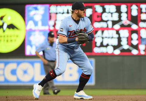 Josh Donaldson of the Minnesota Twins fields the ball in the ninth inning of the game against the Los Angeles Angels at Target Field on July 24, 2021 in Minneapolis, Minnesota.