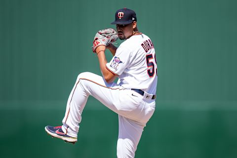 Jhoan Duran of the Minnesota Twins pitches during a spring training game against the Boston Red Sox. (Photo by Brace Hemmelgarn/Minnesota Twins/Getty Images)