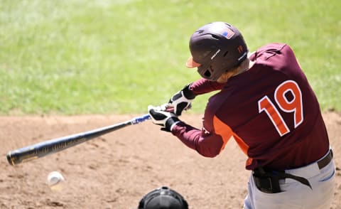 Gavin Cross of the Virginia Tech Hokies hits a foul ball against the North Carolina Tar Heels. (Photo by Eakin Howard/Getty Images)