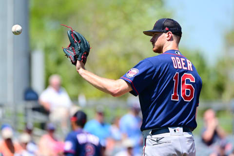 Bailey Ober of the Minnesota Twins looks to receive the ball during a Grapefruit League spring training game. (Photo by Julio Aguilar/Getty Images)