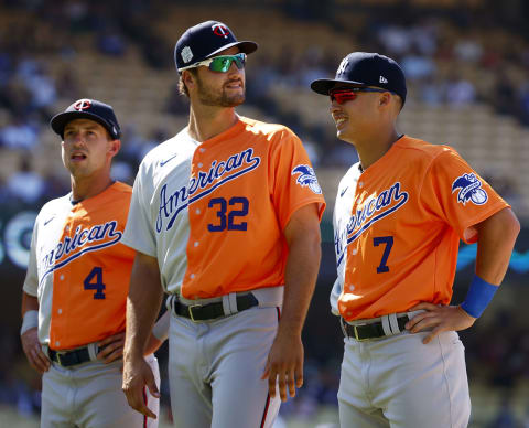 Spencer Steer (No. 4) and Matt Wallner (No. 32) of the Minnesota Twins and Anthony Volpe of the Yankees line up before the SiriusXM All-Star Futures Game. (Photo by Ronald Martinez/Getty Images)