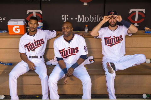 Byron Buxton, Torii Hunter, and Joe Mauer of the Minnesota Twins looks on against the Detroit Tigers. (Photo by Brace Hemmelgarn/Minnesota Twins/Getty Images)