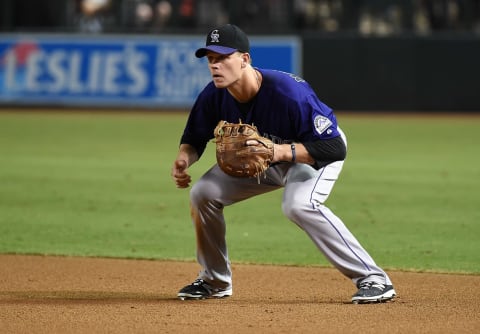 Former Minnesota Twins first baseman Justin Morneau gets ready to make a play on September 29, 2015. (Photo by Norm Hall/Getty Images)