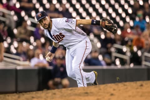 Trevor Plouffe of the Minnesota Twins throws against the Chicago White Sox. (Photo by Brace Hemmelgarn/Minnesota Twins/Getty Images)