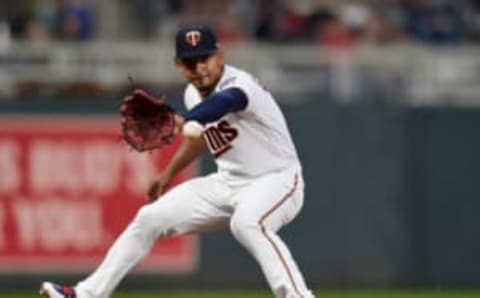 MINNEAPOLIS, MN – MAY 14: Eduardo Escobar #5 of the Minnesota Twins fields the ball at third base hit by Mitch Haniger #17 of the Seattle Mariners during the first inning of the game on May 14, 2018 at Target Field in Minneapolis, Minnesota. (Photo by Hannah Foslien/Getty Images)