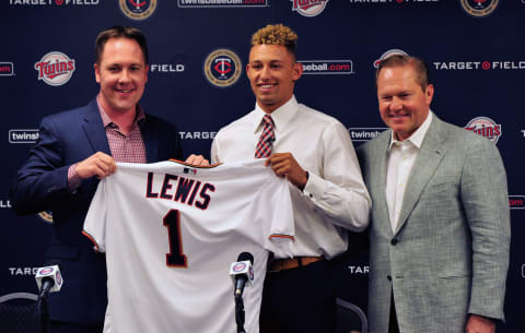 MINNEAPOLIS, MN – JUNE 17: Chief Baseball Officer Derek Falvey of the Minnesota Twins holds up a jersey with number one overall draft pick Royce Lewis and agent Scott Boras at a press conference on June 17, 2017 at Target Field in Minneapolis, Minnesota. (Photo by Hannah Foslien/Getty Images)