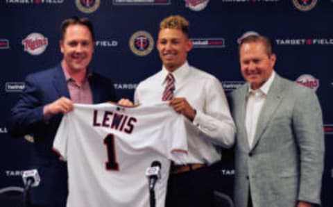 MINNEAPOLIS, MN – JUNE 17: Chief Baseball Officer Derek Falvey of the Minnesota Twins holds up a jersey with number one overall draft pick Royce Lewis and agent Scott Boras at a press conference on June 17, 2017 at Target Field in Minneapolis, Minnesota. (Photo by Hannah Foslien/Getty Images)