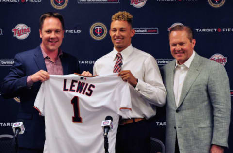 MINNEAPOLIS, MN – JUNE 17: Chief Baseball Officer Derek Falvey of the Minnesota Twins holds up a jersey with number one overall draft pick Royce Lewis and agent Scott Boras at a press conference on June 17, 2017 at Target Field in Minneapolis, Minnesota. (Photo by Hannah Foslien/Getty Images)