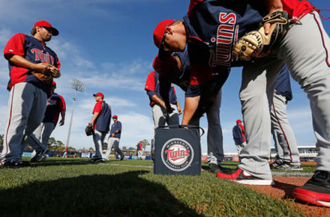 PORT CHARLOTTE, FL – MARCH 11: The Minnesota Twins warm up before the start of a Grapefruit League spring training game against the Tampa Bay Rays at the Charlotte Sports Complex on March 11, 2013 in Port Charlotte, Florida. (Photo by J. Meric/Getty Images)