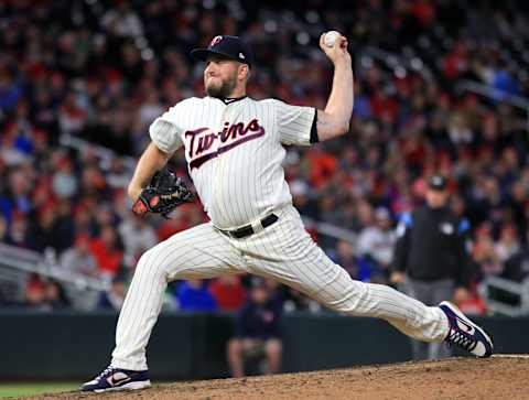 Glen Perkins of the Minnesota Twins pitches against the Detroit Tigers. (Photo by Andy King/Getty Images)