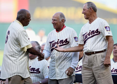 MINNEAPOLIS, MN – AUGUST 1: Tony Oliva, former player with the Minnesota Twins, shakes hands with former teammates Frank Quilici and Jim Kaat during a ceremony honoring the 1965 American League Championship team before the game between the Minnesota Twins and the Seattle Mariners on August 1, 2015 at Target Field in Minneapolis, Minnesota. (Photo by Hannah Foslien/Getty Images)