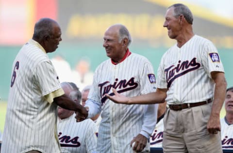 MINNEAPOLIS, MN – AUGUST 1: Tony Oliva, former player with the Minnesota Twins, shakes hands with former teammates Frank Quilici and Jim Kaat during a ceremony honoring the 1965 American League Championship team before the game between the Minnesota Twins and the Seattle Mariners on August 1, 2015 at Target Field in Minneapolis, Minnesota. (Photo by Hannah Foslien/Getty Images)