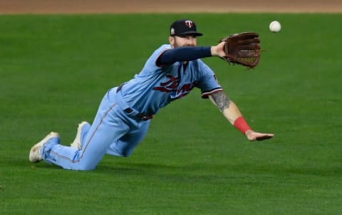 Jake Cave of the Minnesota Twins makes a catch in left field of the ball hit by Victor Reyes of the Detroit Tigers. (Photo by Hannah Foslien/Getty Images)