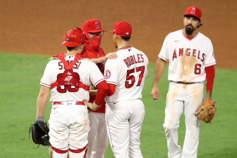 Hansel Robles is pulled from the game by Angels manager Joe Maddon. (Photo by Sean M. Haffey/Getty Images)