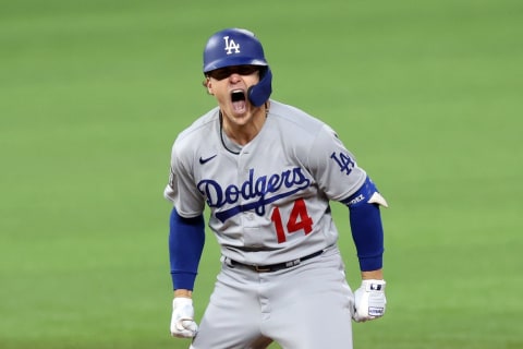 Enrique Hernández of the Los Angeles Dodgers celebrates after hitting an RBI double. (Photo by Tom Pennington/Getty Images)