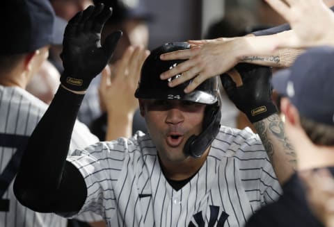 Gary Sanchez of the New York Yankees celebrates his eighth inning two run home run against the Texas Rangers. (Photo by Jim McIsaac/Getty Images)