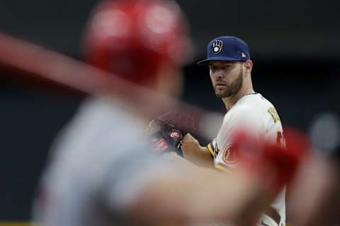 Adrian Houser of the Milwaukee Brewers throws a pitch against the St. Louis Cardinals. (Photo by John Fisher/Getty Images)