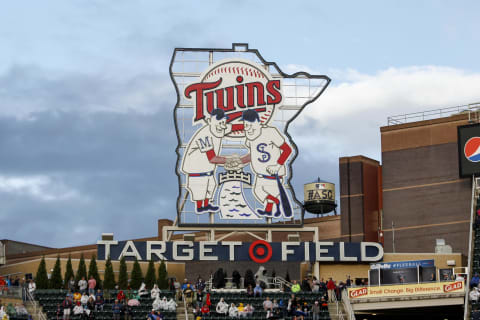 The Target Field sign stands in front of a water tower with the All-Star Game logo on it. (Photo by Bruce Kluckhohn/Minnesota Twins/Getty Images)