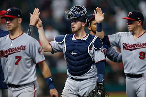 CLEVELAND, OH – AUGUST 07: Mitch Garver #23 of the Minnesota Twins celebrates with teammates after a 3-2 victory over the Cleveland Indians at Progressive Field on August 7, 2018 in Cleveland, Ohio. (Photo by Ron Schwane/Getty Images)