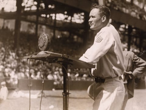 American baseball player Walter Johnson (1887 – 1946), pitcher for the Washington Sentors, makes a speech during the celebration of his 20th year with the team at Griffith Stadium, Washington, DC, November 1927. (Photo by Hulton Archive/Getty Images)